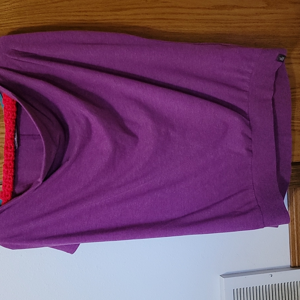 North Face ladies top never worn.  No tags.  From a smoke free home